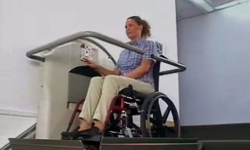 Woman using Stair lift